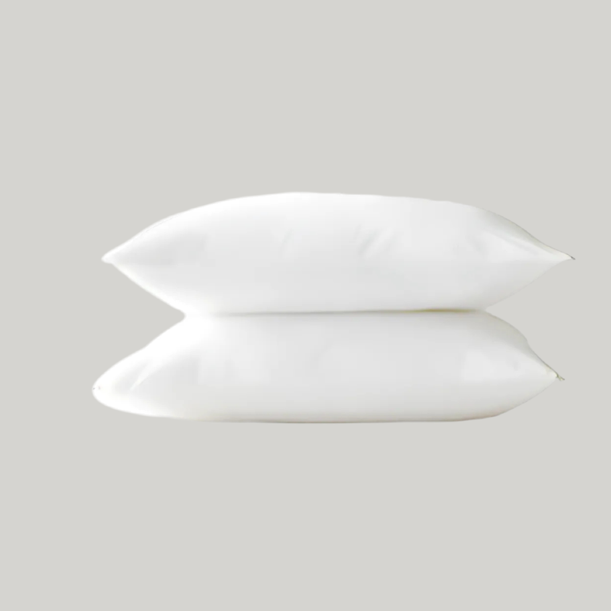 Cozy and resilient fiber-filled pillow insert, offering plush comfort for your home decor. Perfect for throw pillows, bedding, and sofas