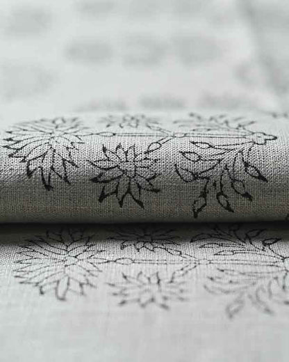 Gray fabric with black floral patterns
