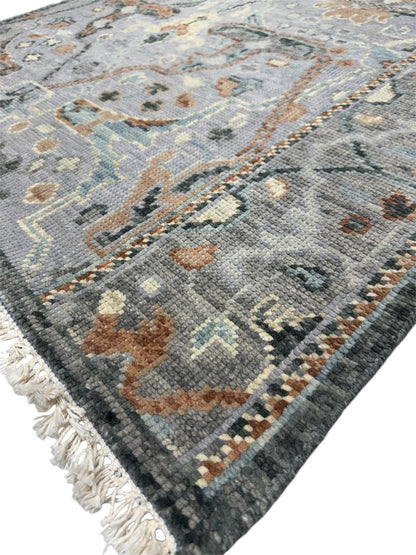 Vintage Motifs Hand Knotted Oushak Rug with Tassels